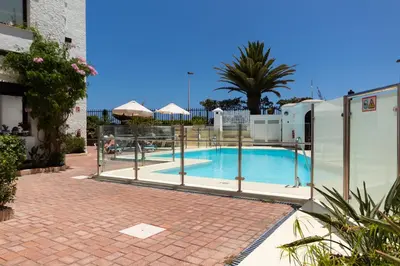 Piscina en o cerca de Primera linea de Playa del Ingles y las Dunas de Maspalomas