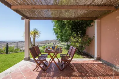 Un balcón o terraza de HomeForGuest SALOBRE GOLF VILLA, POOL, BBQ, WIFI, STUNNING VIEWS