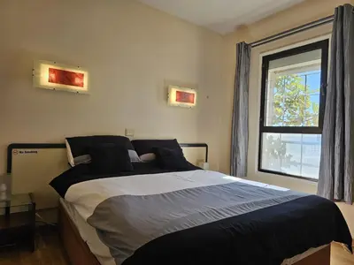 Cama o camas de una habitación en Iguazu Yumbo - Two Bedroom Apt