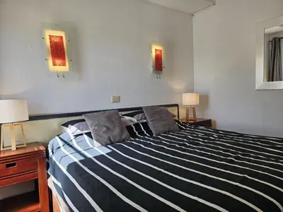 Cama o camas de una habitación en Iguazu Yumbo - Two Bedroom Apt