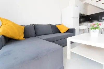 Zona de estar de bungalow with terrace near the beach