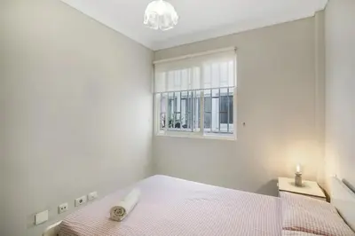 Cama o camas de una habitación en Spacious apartment in Las Palmas de Gran Canaria - 85 m² with WiFi