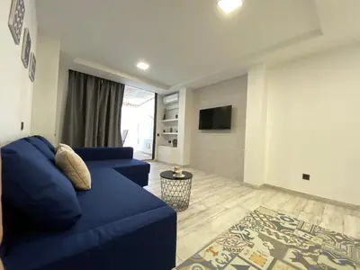 Una televisión o centro de entretenimiento en MAGUI´S PLACE