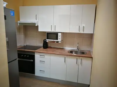 Una cocina o zona de cocina en Bungalows Playa Flor, Campo Internacional, Maspalomas.