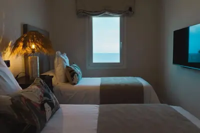 Cama o camas de una habitación en CASA ESPERANZA *Family Home Over the Sea*