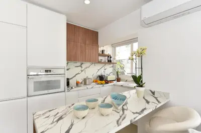 Una cocina o zona de cocina en Maspalomas Beach apartment La Charca III by VillaGranCanaria