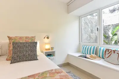 Cama o camas de una habitación en Maspalomas Beach apartment La Charca III by VillaGranCanaria