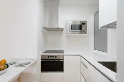 Una cocina o zona de cocina en Living Las Canteras Homes - BEACHFRONT CASA DEL SUNSET