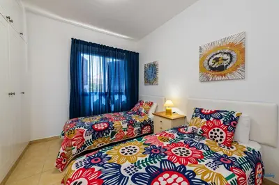 Cama o camas de una habitación en Bahía Meloneras Fase II