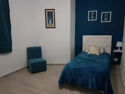 Cama o camas de una habitación en La Naval 209, 5ºA - LONDRES -