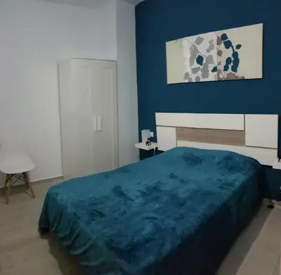 Cama o camas de una habitación en La Naval 209, 5ºA - LONDRES -