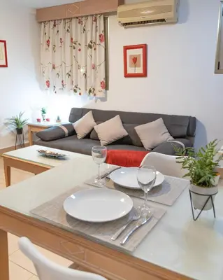 Zona de estar de Apartamentos Oasis Sol