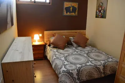 Cama o camas de una habitación en Apartment 100 meters from Puerto Rico Beach