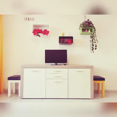 Una televisión o centro de entretenimiento en Maspalomas Casa La Loba