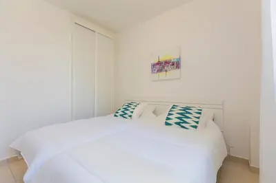 Cama o camas de una habitación en Apartamento Jumilla Vista Mar 23