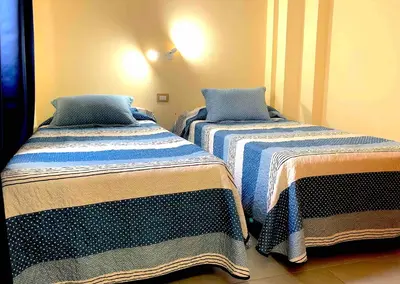 Cama o camas de una habitación en Apartamentos La Puntilla Mogan