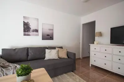 Zona de estar de Acogedor Apartamento Gara 54 Arguineguin