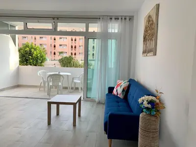 Zona de estar de Calm, Cosy and Bright apartment renovated in playa del ingles- WiFi free