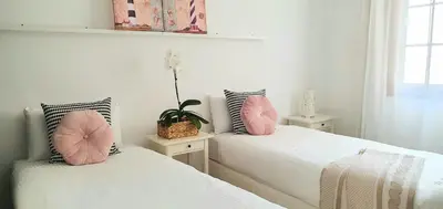 Cama o camas de una habitación en HD Mogan Beach Apartment