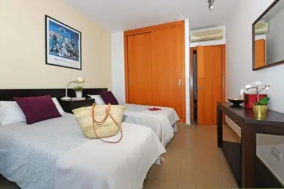 Cama o camas de una habitación en Salobre Golfers 12