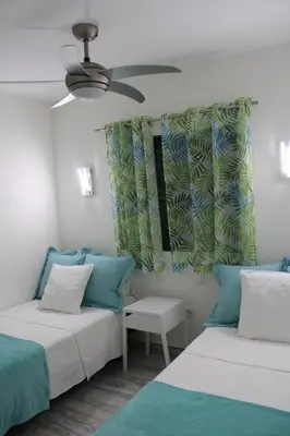 Cama o camas de una habitación en Solymar Las Olas