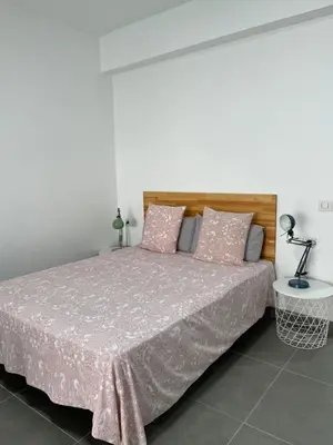 Cama o camas de una habitación en Enjoy Las Canteras