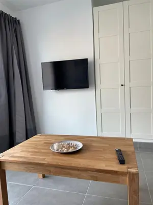 Una televisión o centro de entretenimiento en Enjoy Las Canteras