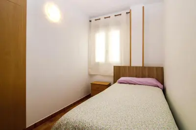 Cama o camas de una habitación en VVROMPEOLAS