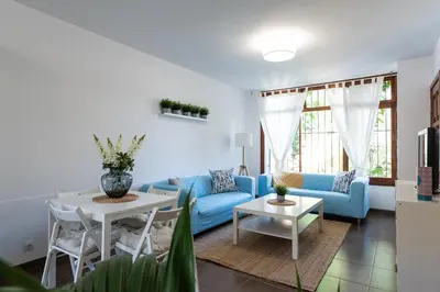 Zona de estar de Bungalow next to the Beach