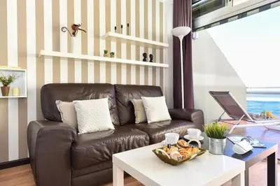 Zona de estar de Beachfront Apartment Las Canteras LM52YY by VillaGranCanaria