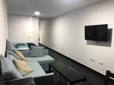 Una televisión o centro de entretenimiento en Canteras Reef - Primera linea de mar super céntrico