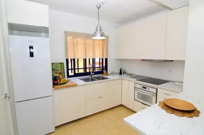 Una cocina o zona de cocina en Bahía Meloneras II 5