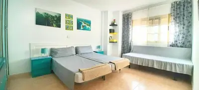 Cama o camas de una habitación en 5 minutes close by Playa del Inglés-1&2BR aptm with view & private terrace for 2 persons