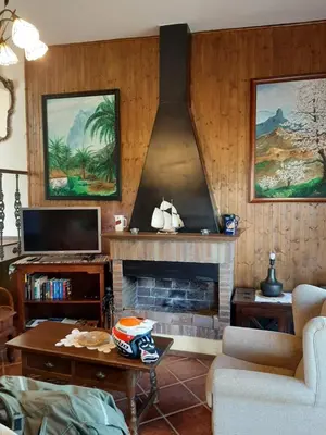 Una televisión o centro de entretenimiento en FINCA EL PEDREGAL