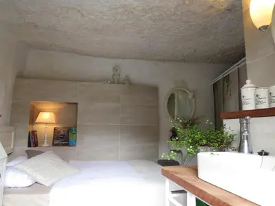 Cama o camas de una habitación en La cueva de Ángel B&B