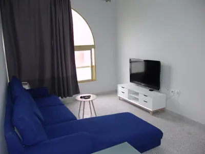 Una televisión o centro de entretenimiento en TABLERO 302, MAGNIFICO Apto 6 pax cerca PLAYA INGLES