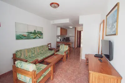 Una televisión o centro de entretenimiento en Montecarlo Apartamento30