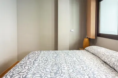 Cama o camas de una habitación en Central Las Canteras Beach