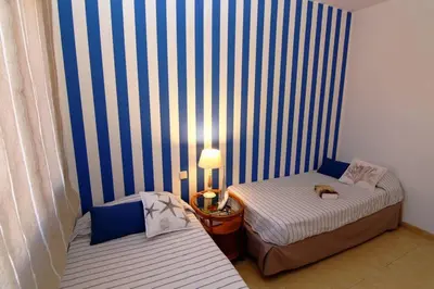 Cama o camas de una habitación en BAHIA MELONERAS II 62