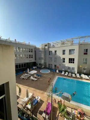 Piscina en o cerca de APARTAMENT SARDINA NEAR THE BEACH WITH POOL AND WIFI I