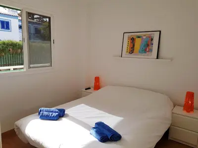 Cama o camas de una habitación en Apartamento Jumilla Vista Mar 22