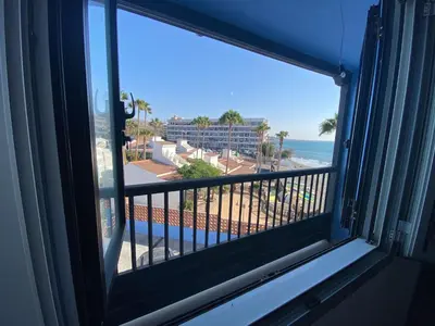 Un balcón o terraza de Bungalow frente al mar - Sun Club Playa del Aguila