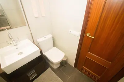 Un baño de Arinaga Zone