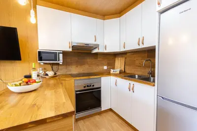 Una cocina o zona de cocina en Sand Friendly Holiday Home
