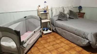 Cama o camas de una habitación en Casa Mamatita