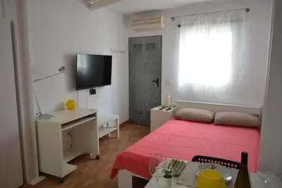 Una televisión o centro de entretenimiento en Maspalomas Studio