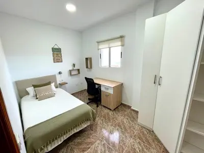Cama o camas de una habitación en Vivienda Vacacional Norte Sol