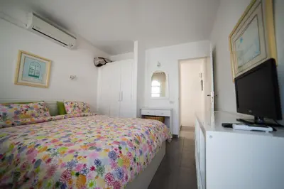 Cama o camas de una habitación en Acogedor bungalow muy luminoso