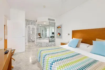Cama o camas de una habitación en Anfi del Mar 1