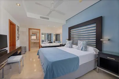 Cama o camas de una habitación en Anfi del Mar Tauro Golf 2 Emerald Club